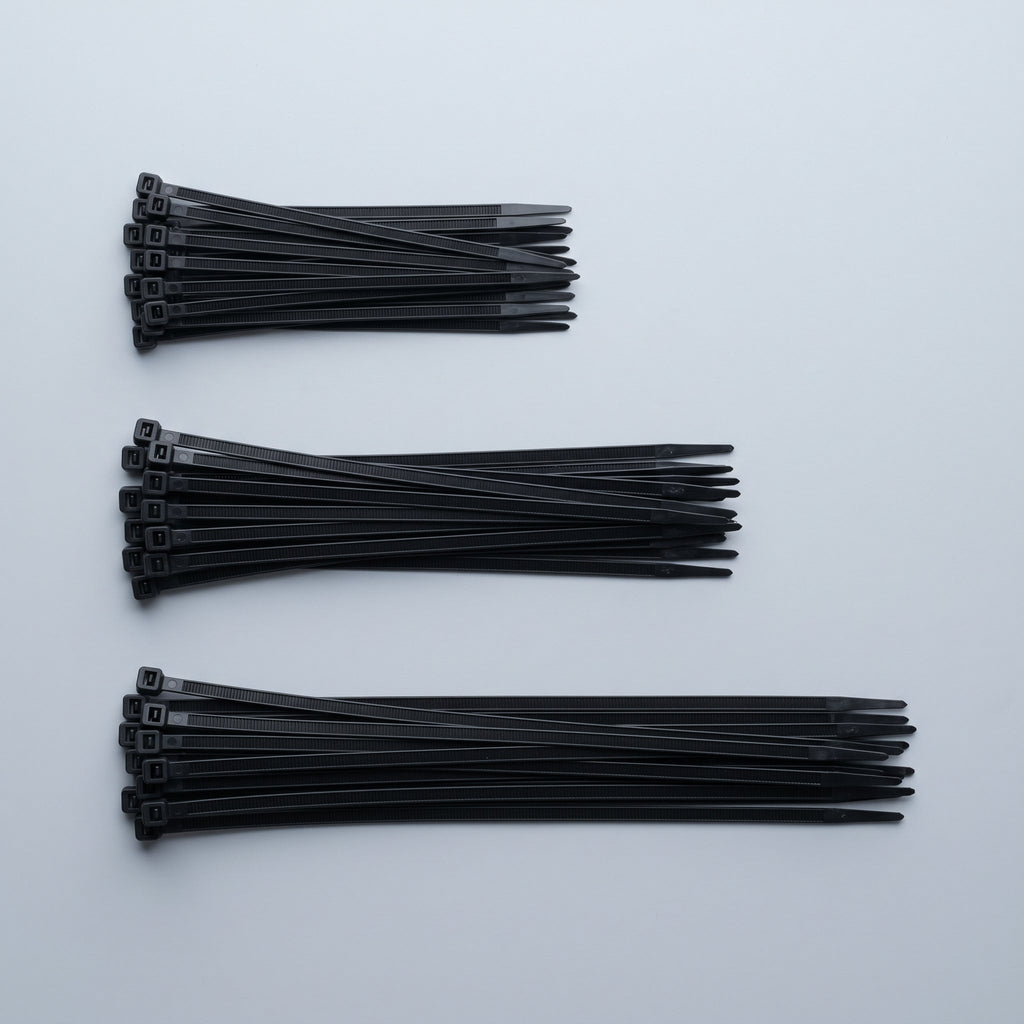 Colliers de serrage nylon noir en trois longueurs : 3 × 100 mm, 3 × 150 mm et 3 × 200 mm